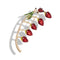 Broche décorative représentant des fraises rouges et une coccinelle sur une tige dorée incurvée.