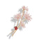 Délicate broche en or ornée de marguerites en émail rose et d’une coccinelle rouge.
