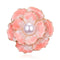 Broche fleur en émail rose avec un centre en perle et une bordure en métal doré.