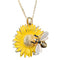 Pendentif en forme de tournesol jaune avec une abeille sur une chaîne en or.