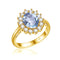 Bague en argent sterling plaqué or ornée d’une pierre précieuse bleu clair entourée de cristaux clairs dans un halo floral.