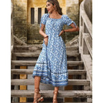 Robe Fleurie Mi-Longue Epaules Dénudées - Vignette | Dame Fleur