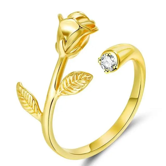 Bague rose en or avec un diamant.