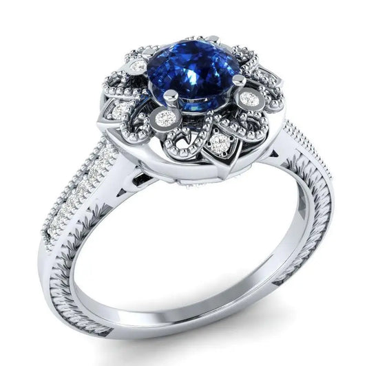 Bague en pierre bleue avec accents en diamant.