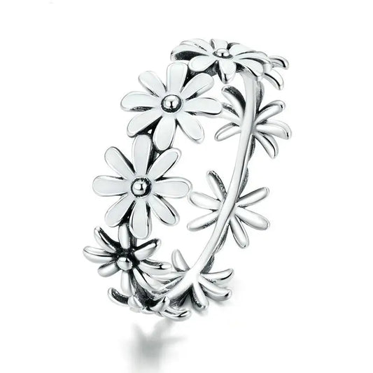 Bague marguerite argentée.