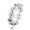 Bague marguerite argentée.