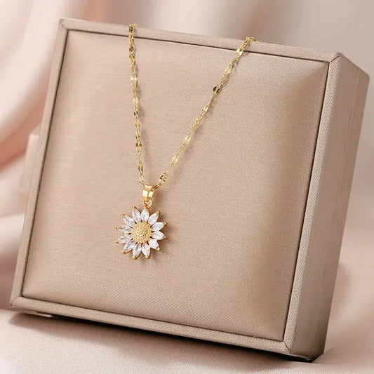 Collier à pendentifs en forme de tournesol en or.