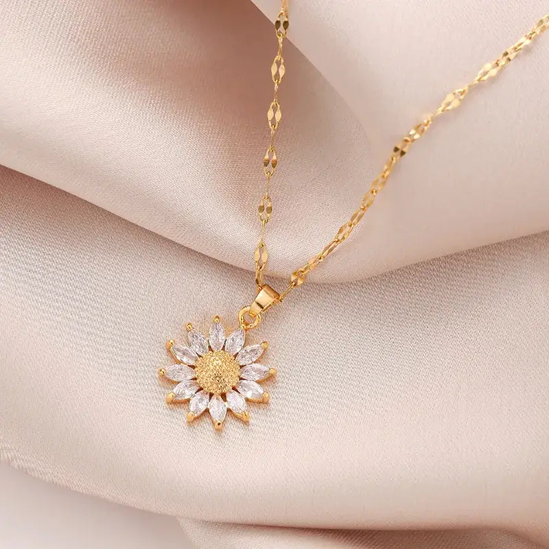 Collier à pendentifs en forme de tournesol en or.
