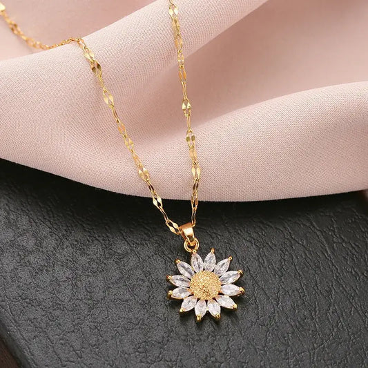 Collier à pendentifs en forme de tournesol en or.